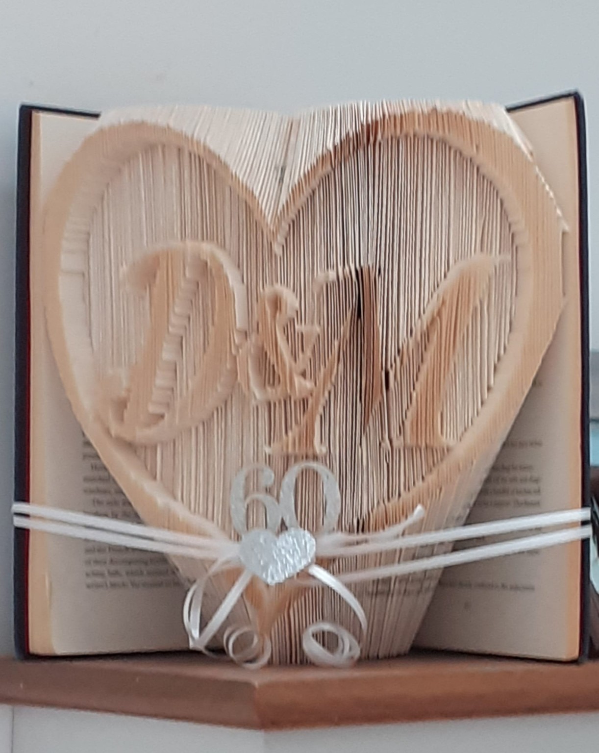 Personalised initials inside an anniversary heart book fold